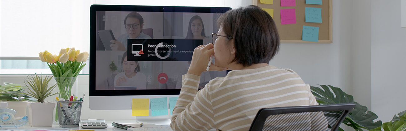 Woman's screen is buffering, interrupting her video conference call